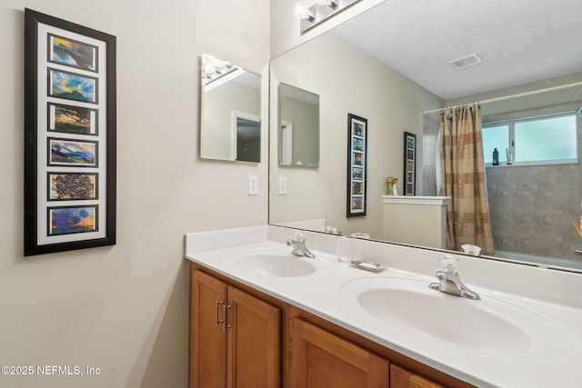 95062 Mackinas Cir, Fernandina Beach, FL 32034 - full bath featuring double vanity, a shower with shower curtain, visible vents, and a sink