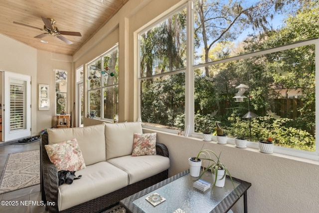95062 Mackinas Cir, Fernandina Beach, FL 32034 - sunroom with a ceiling fan and an outdoor living space