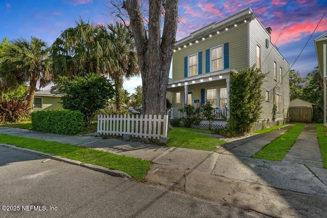 29 Grant St, Saint Augustine, FL 32084 - view of front of property with covered porch and fence
