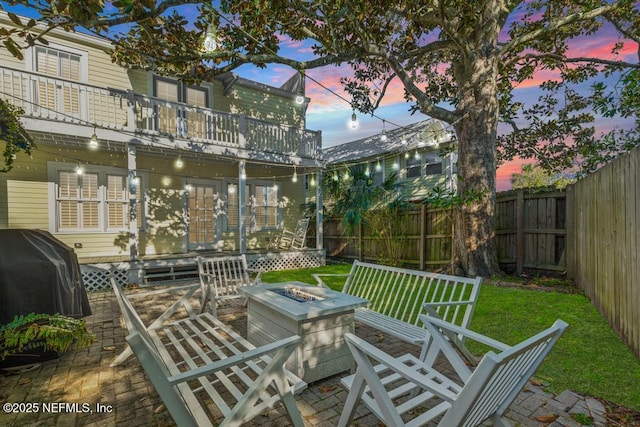 29 Grant St, Saint Augustine, FL 32084 - view of patio with an outdoor fire pit, area for grilling, and a balcony