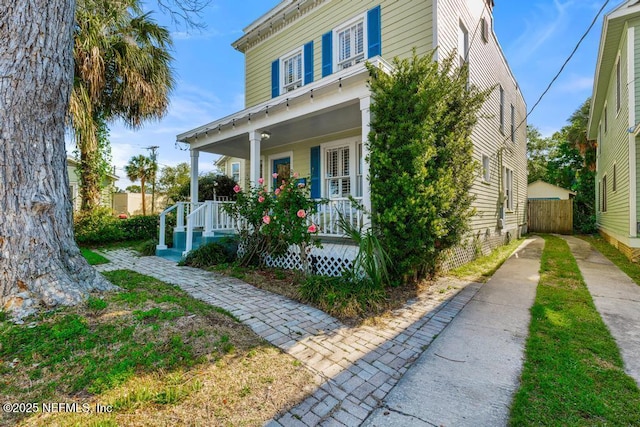 29 Grant St, Saint Augustine, FL 32084 - view of front of property featuring covered porch and fence