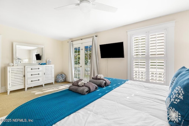 29 Grant St, Saint Augustine, FL 32084 - carpeted bedroom with access to exterior and a ceiling fan