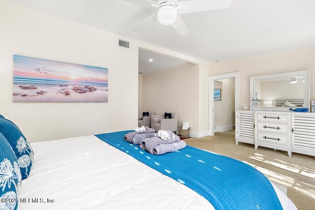 29 Grant St, Saint Augustine, FL 32084 - bedroom with light carpet, a ceiling fan, and baseboards