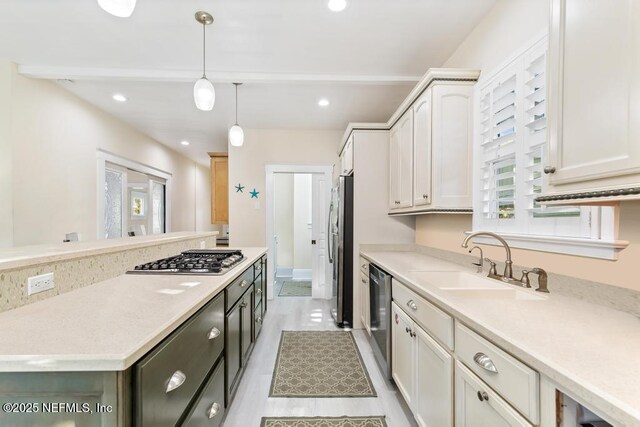 29 Grant St, Saint Augustine, FL 32084 - kitchen with appliances with stainless steel finishes, a sink, plenty of natural light, light countertops, and recessed lighting