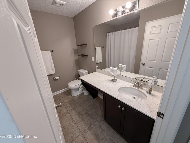 3118 Steeple Pine Ct, Middleburg, FL 32068 - bathroom featuring a textured ceiling, tile patterned flooring, toilet, vanity, and a shower with curtain