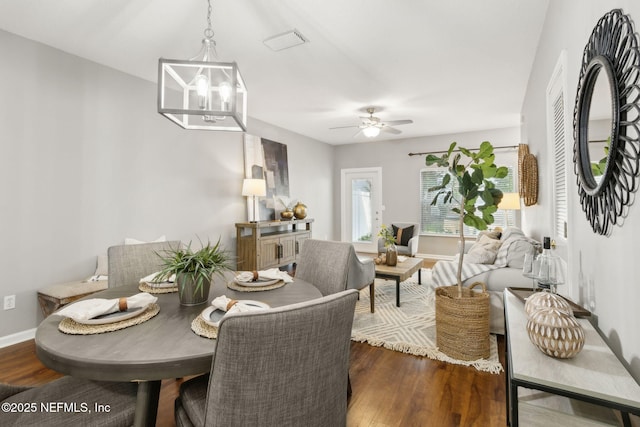 542 Southbranch Dr, Saint Johns, FL 32259 - dining space with baseboards, ceiling fan with notable chandelier, dark wood-style floors, and visible vents