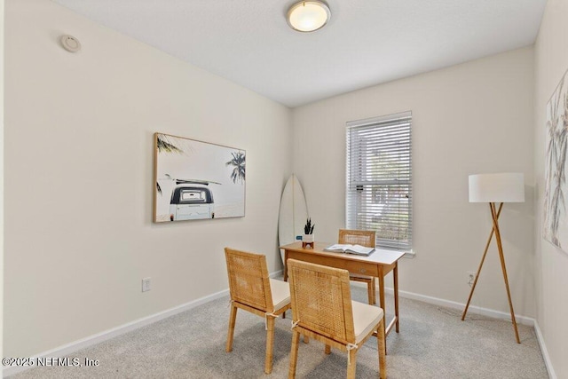 office with carpet flooring and baseboards