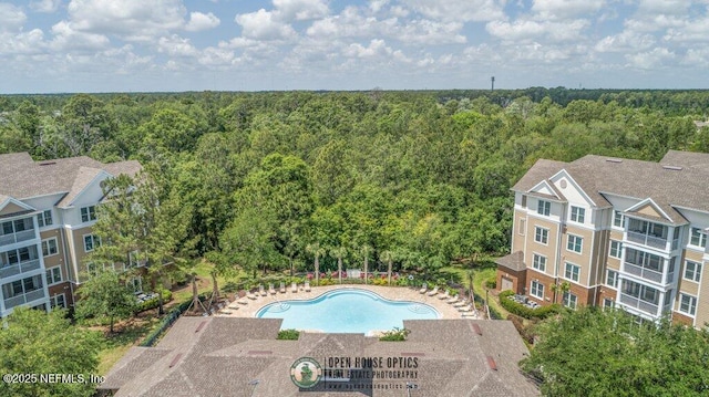 aerial view featuring a view of trees