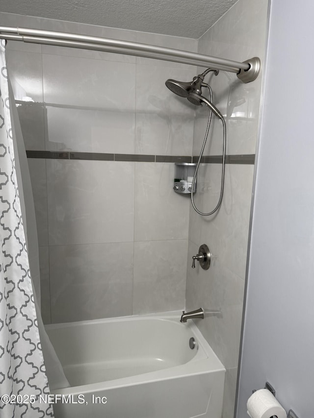 13248 Grant Logan Ln, Jacksonville, FL 32225 - bathroom with shower / bathtub combination with curtain and a textured ceiling