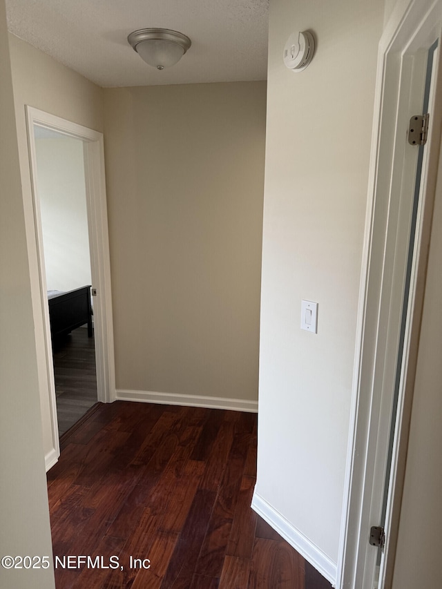 13248 Grant Logan Ln, Jacksonville, FL 32225 - hallway featuring baseboards and wood finished floors