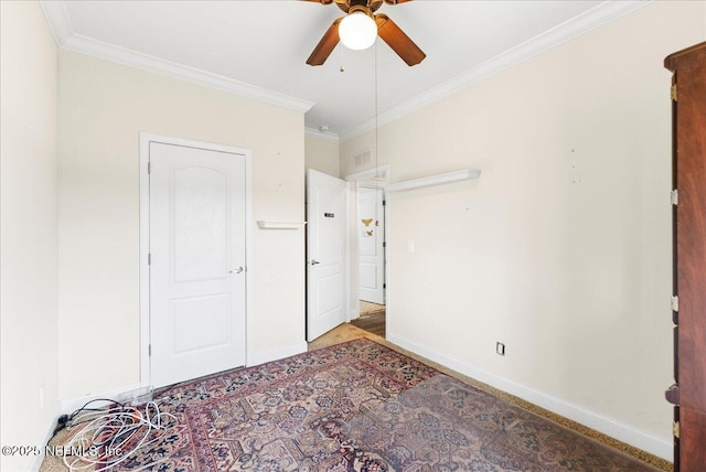 94245 Palm Cir W, Fernandina Beach, FL 32034 - bedroom featuring baseboards, visible vents, crown molding, and ceiling fan