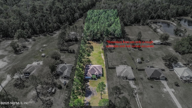9587 Ford Rd, Bryceville, FL 32009 - birds eye view of property featuring a view of trees