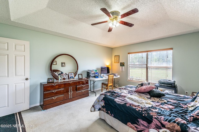 9587 Ford Rd, Bryceville, FL 32009 - bedroom featuring light colored carpet, baseboards, a textured ceiling, a raised ceiling, and a ceiling fan