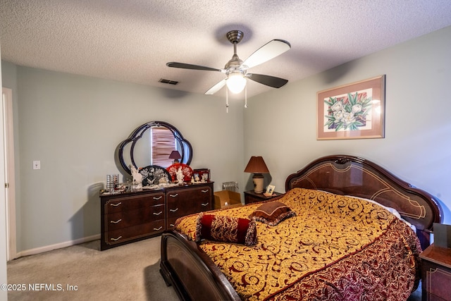 9587 Ford Rd, Bryceville, FL 32009 - bedroom featuring a textured ceiling, baseboards, light colored carpet, and visible vents