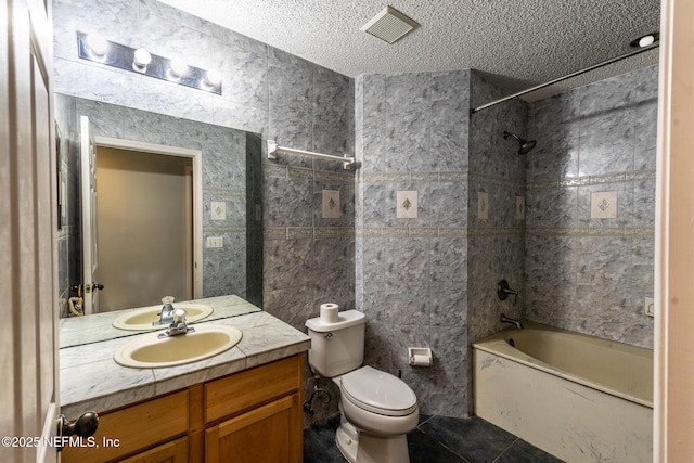 9587 Ford Rd, Bryceville, FL 32009 - bathroom featuring vanity, toilet, a textured ceiling, visible vents, and  shower combination