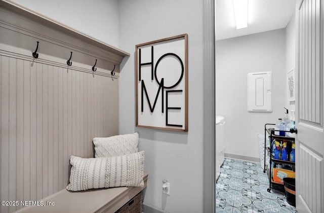 1021 Oakland Hills Ave, Middleburg, FL 32068 - mudroom featuring baseboards and electric panel