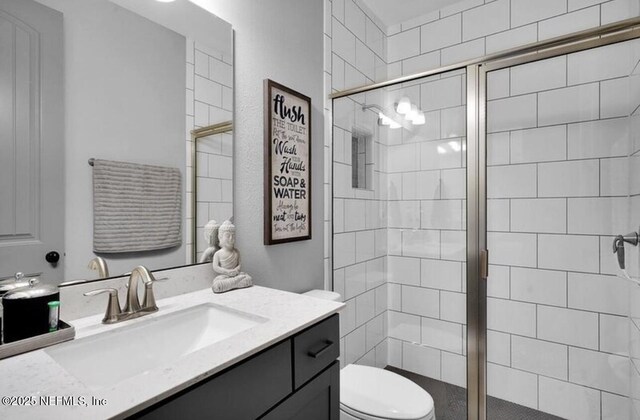 1021 Oakland Hills Ave, Middleburg, FL 32068 - full bath featuring a shower stall, toilet, and vanity