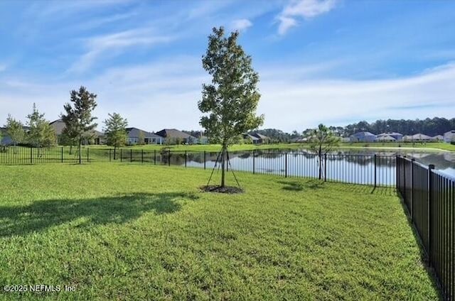 1021 Oakland Hills Ave, Middleburg, FL 32068 - view of yard with a water view and fence