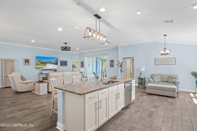 116 Providence Dr, Saint Augustine, FL 32092 - kitchen featuring open floor plan, visible vents, a sink, and dishwasher