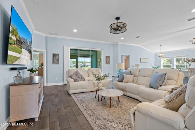 116 Providence Dr, Saint Augustine, FL 32092 - living area featuring dark wood-style floors, visible vents, crown molding, and a healthy amount of sunlight