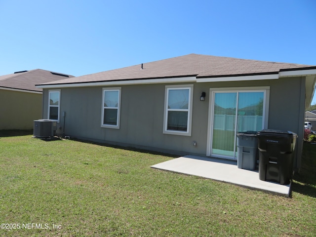 3282 Little Fawn Ln, Green Cove Springs, FL 32043 - rear view of property featuring a patio, a shingled roof, central AC, and a lawn