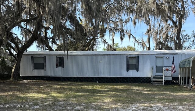 123 Kolski Dr, Crescent City, FL 32112 - view of front of home with a front yard