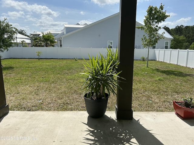 view of yard featuring a patio and a fenced backyard