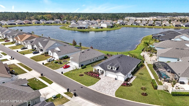 aerial view featuring a residential view and a water view