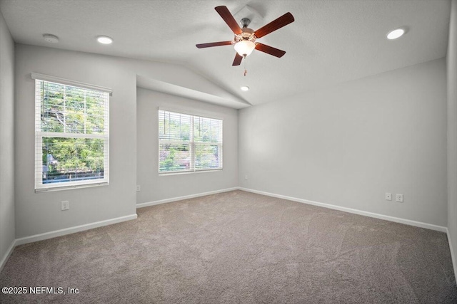 8910 Free Ave, Jacksonville, FL 32211 - carpeted empty room with baseboards, ceiling fan, a textured ceiling, recessed lighting, and vaulted ceiling