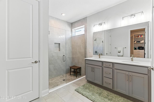 212 Fawnwood St, Saint Johns, FL 32259 - full bathroom with double vanity, a sink, a stall shower, and tile patterned flooring