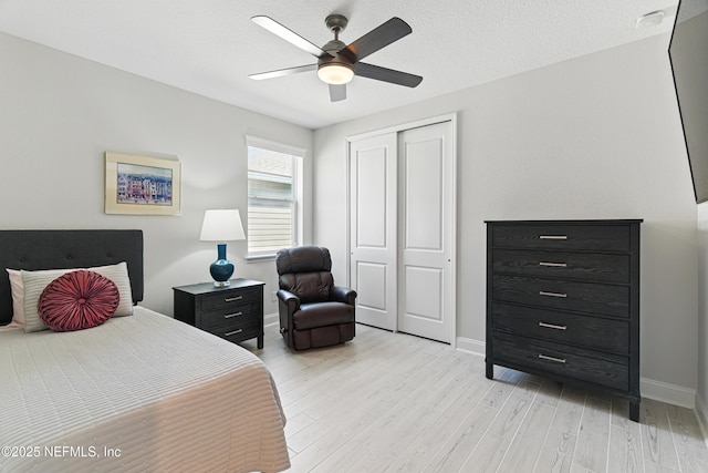 212 Fawnwood St, Saint Johns, FL 32259 - bedroom featuring baseboards, a closet, a textured ceiling, and light wood-type flooring