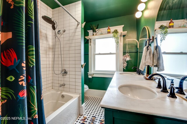 2855 Post St, Jacksonville, FL 32205 - bathroom featuring double vanity, shower / bathtub combination with curtain, a sink, and toilet