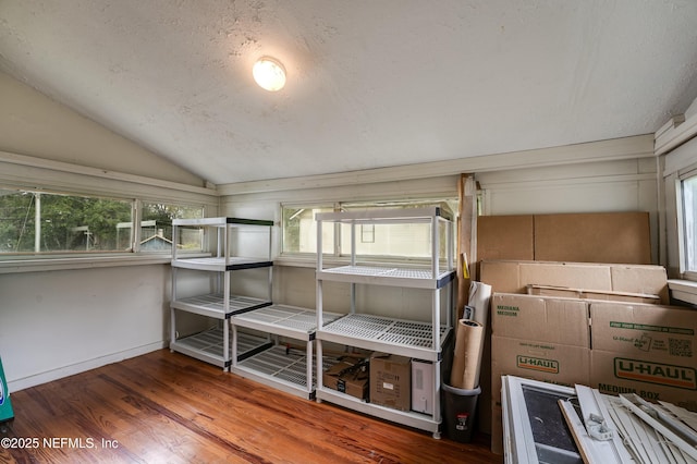 2855 Post St, Jacksonville, FL 32205 - interior space with a textured ceiling, vaulted ceiling, and wood finished floors