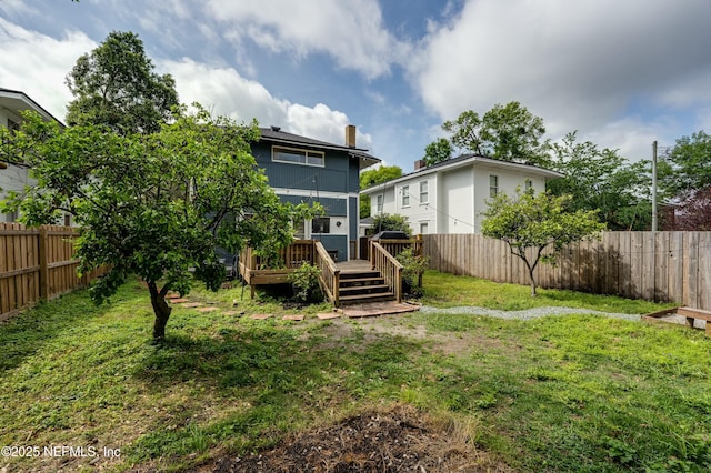 2855 Post St, Jacksonville, FL 32205 - view of yard featuring a fenced backyard and a wooden deck