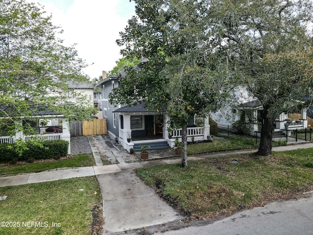 2855 Post St, Jacksonville, FL 32205 - view of front of property featuring covered porch, concrete driveway, and fence