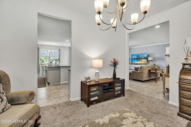 12424 Shady Bridge Trl, Jacksonville, FL 32258 - interior space featuring baseboards, a sink, a chandelier, a textured ceiling, and crown molding