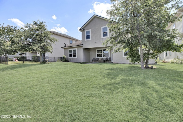 12424 Shady Bridge Trl, Jacksonville, FL 32258 - back of property featuring stucco siding, fence, and a lawn
