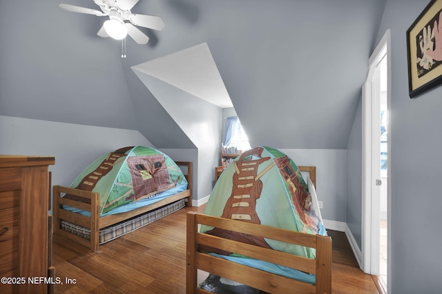 1365 Grosvenor Square Dr, Jacksonville, FL 32207 - bedroom featuring baseboards, lofted ceiling, and wood finished floors