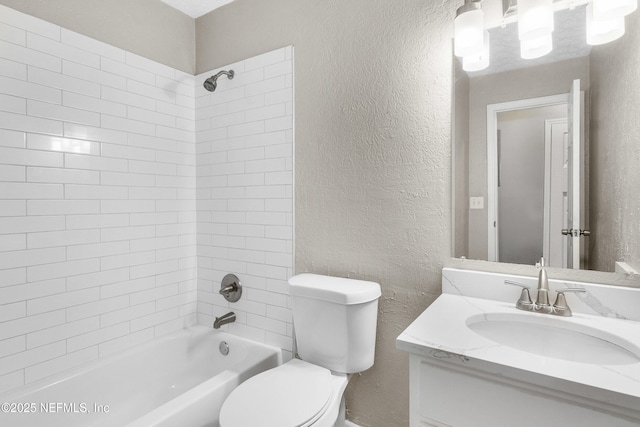 7653 Rolling Hills Dr, Jacksonville, FL 32221 - full bathroom featuring shower / washtub combination, toilet, vanity, and a textured wall