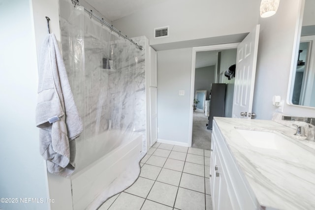 full bathroom featuring visible vents, baseboards, tile patterned floors, vanity, and shower / bath combo with shower curtain