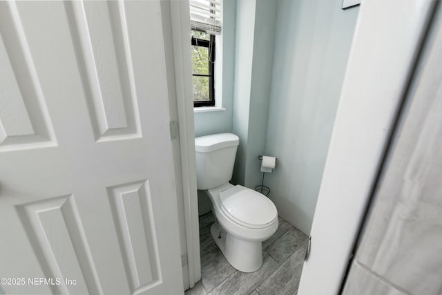 bathroom featuring toilet