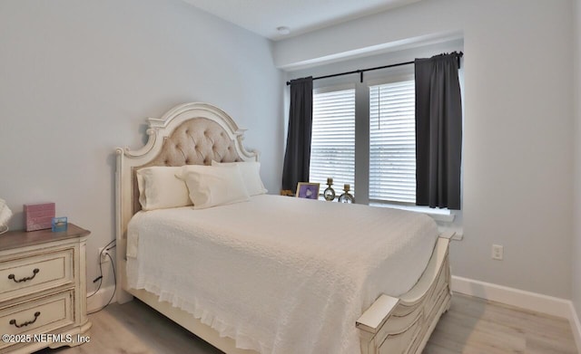 11466 Leatherback Ct, Jacksonville, FL 32256 - bedroom featuring baseboards and light wood-type flooring