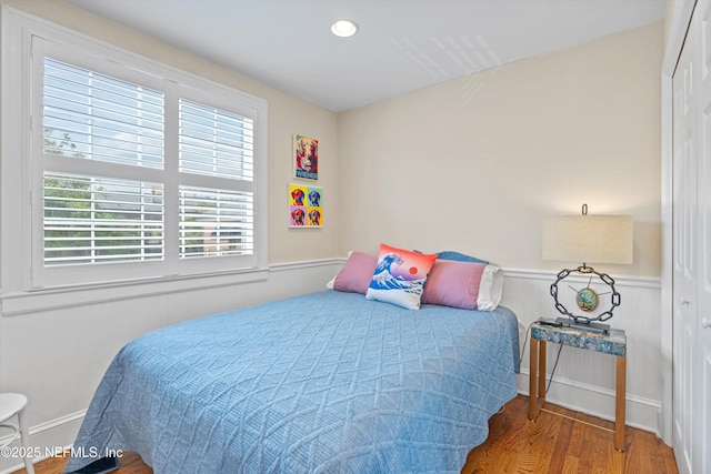 819 Lasalle St Unit 819, Jacksonville, FL 32207 - bedroom featuring wood finished floors, recessed lighting, a closet, and wainscoting