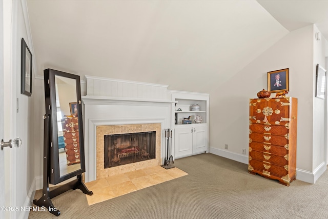 819 Lasalle St Unit 819, Jacksonville, FL 32207 - living room with a fireplace, carpet flooring, lofted ceiling, and baseboards