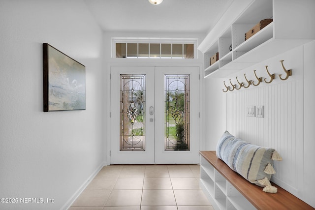 119 Cypress Banks Dr, Saint Johns, FL 32259 - mudroom featuring french doors, baseboards, and light tile patterned floors