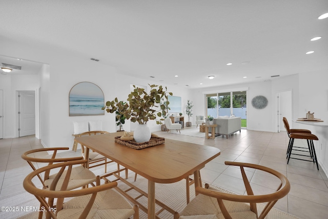 119 Cypress Banks Dr, Saint Johns, FL 32259 - dining room with light tile patterned flooring, recessed lighting, and baseboards