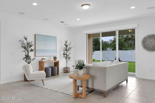 119 Cypress Banks Dr, Saint Johns, FL 32259 - living area with recessed lighting, baseboards, and light tile patterned floors