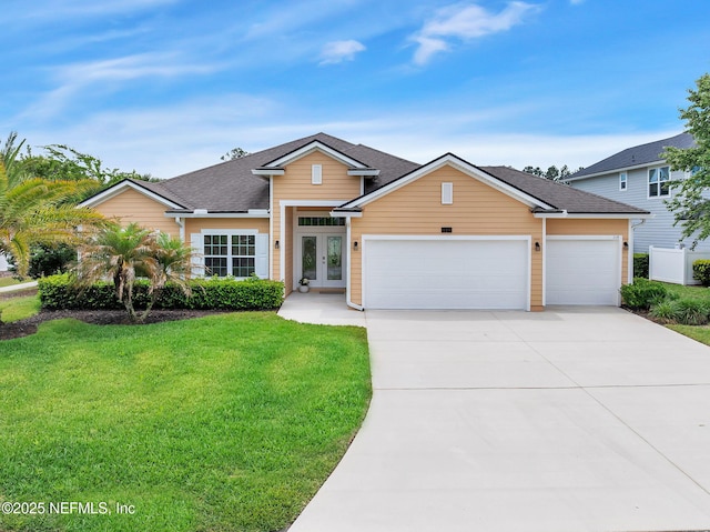 119 Cypress Banks Dr, Saint Johns, FL 32259 - traditional-style house featuring french doors, an attached garage, a front lawn, driveway, and roof with shingles