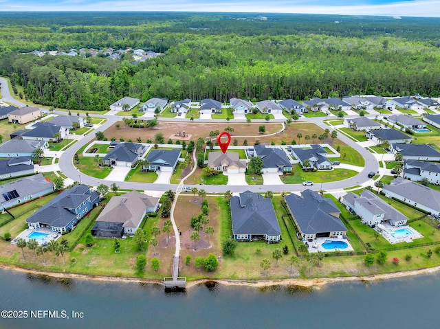 119 Cypress Banks Dr, Saint Johns, FL 32259 - aerial overview of property's location with a heavily wooded area, nearby suburban area, and a large body of water