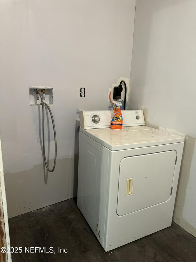 1103 Palm Cir, Jacksonville Beach, FL 32250 - clothes washing area with washer hookup, dark wood-style floors, electric dryer hookup, and laundry area